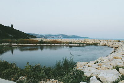 Scenic view of lake against clear sky