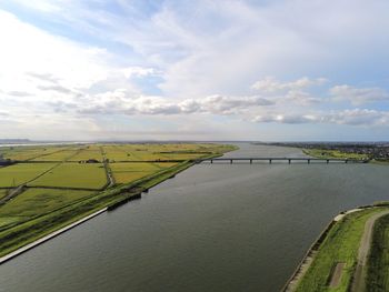 Scenic view of river against sky