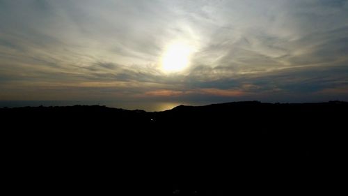 Silhouette of landscape against sky during sunset