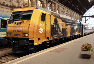 Train at railroad station in city