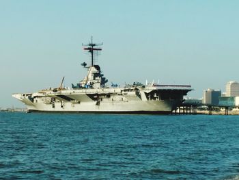 Ship in sea against clear sky