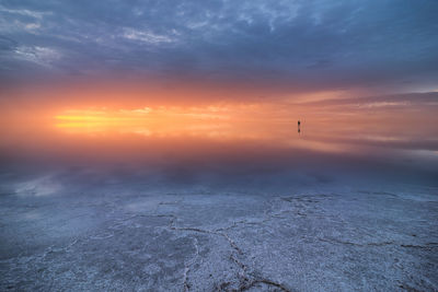 Scenic view of salty lagoon located near sea in penahueca under sundown sky