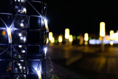 Illuminated street lights at night