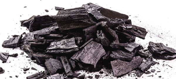 Close-up of stack of rock against white background