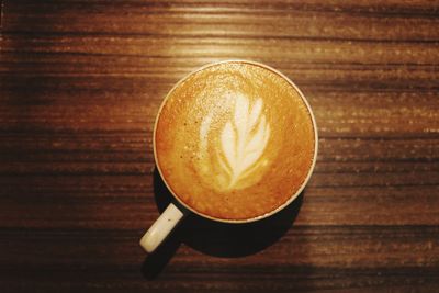 High angle view of cappuccino on table