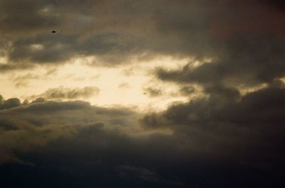 Low angle view of clouds in sky during sunset