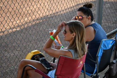 Young woman sitting on seat