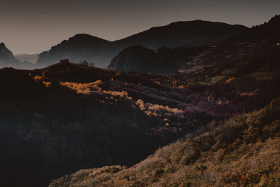 Scenic view of mountains against sky during sunset