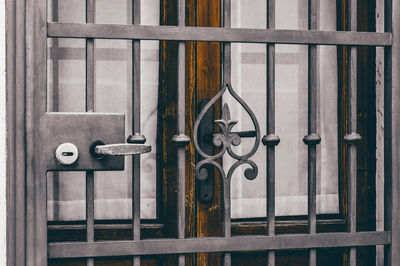 Close-up of padlocks on railing