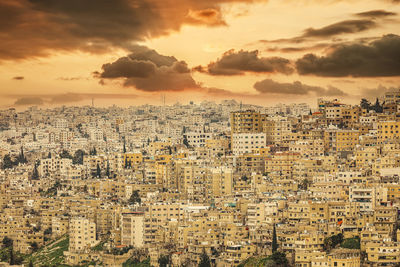 High angle view of townscape against sky during sunset