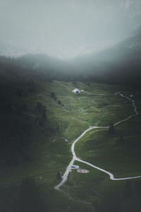 High angle view of winding road against sky