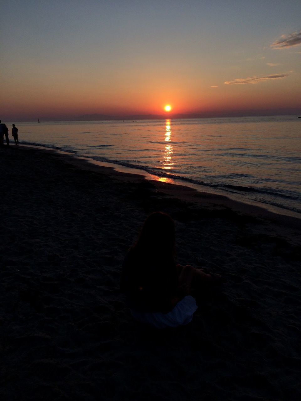 sea, sunset, horizon over water, water, sun, silhouette, scenics, tranquil scene, beauty in nature, tranquility, beach, orange color, leisure activity, lifestyles, idyllic, sky, shore, nature