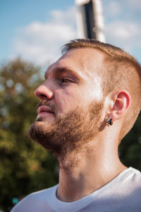 Close-up of young man looking away