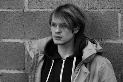 Close-up of young man with piercings