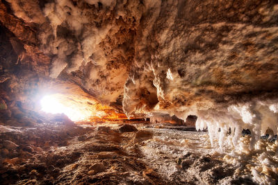 Sun shining through rocks