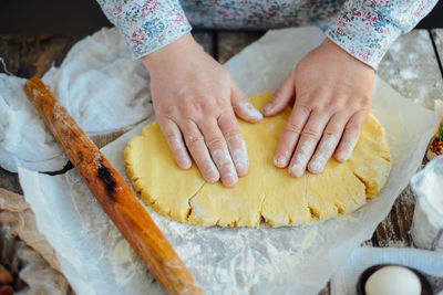 Midsection of woman preparing food