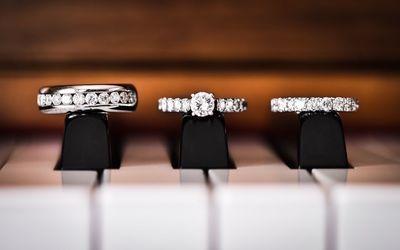 Close-up of diamond rings on piano