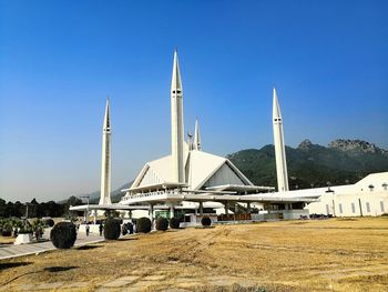 View of greatest mosque against clear blue sky