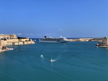 Scenic view of sea against blue sky