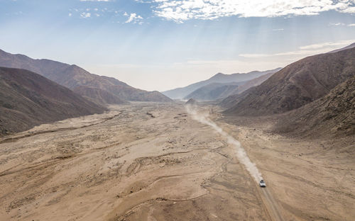 Panoramic view of desert against sky