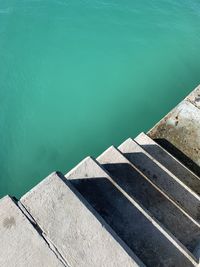 High angle view of swimming pool by lake