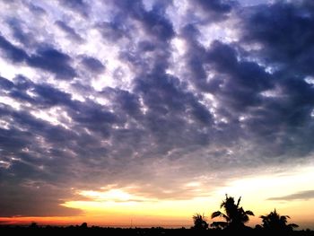 Scenic view of dramatic sky during sunset