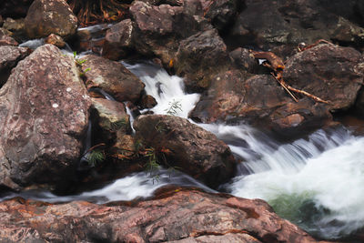 Stream flowing through rocks