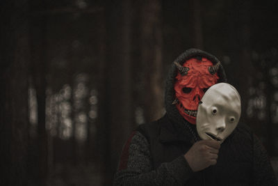 Portrait of person wearing mask during winter