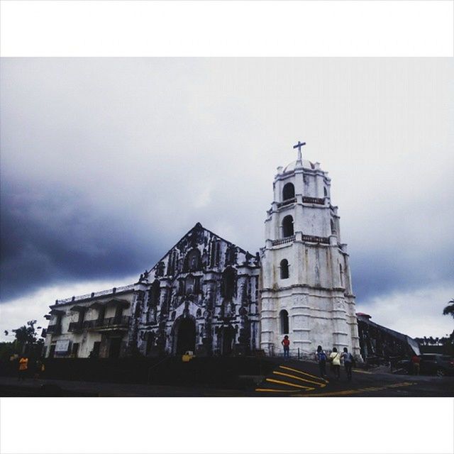 architecture, building exterior, built structure, transfer print, church, religion, place of worship, sky, spirituality, auto post production filter, cathedral, low angle view, cloud - sky, history, cloudy, cloud, travel destinations, outdoors