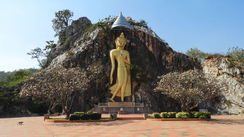 Low angle view of statue against sky