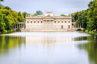 Lake in front of building