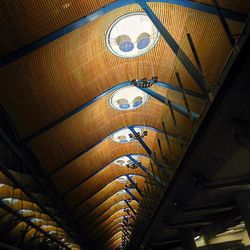 Low angle view of illuminated ceiling