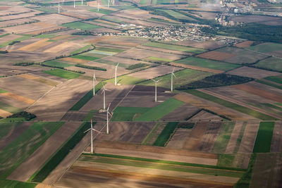Aerial photography of austrian agriculture fields, wind turbines, infrastructure and landscapes