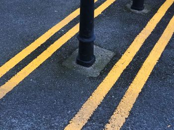 High angle view of poles on street