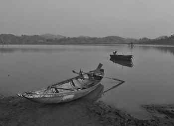 Boats in calm lake