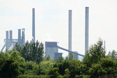 View of factory against sky