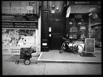 Men on bicycle in city