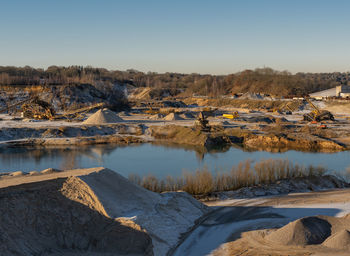 Gravel quarrying in a gravel pit during a drone flight