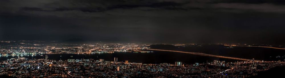 Aerial view of illuminated cityscape at night