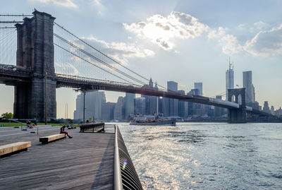 Bridge over river against sky