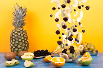 Close-up of pineapple fruits on table