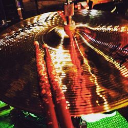 High angle view of illuminated machine in container