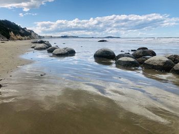 Scenic view of beach against sky