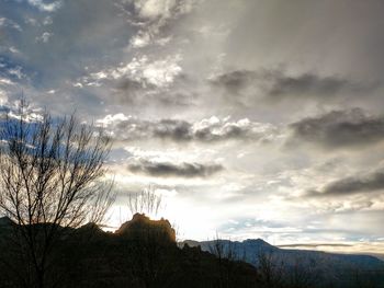 Scenic view of mountains against sky during sunset