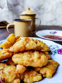 Close-up of breakfast served on table