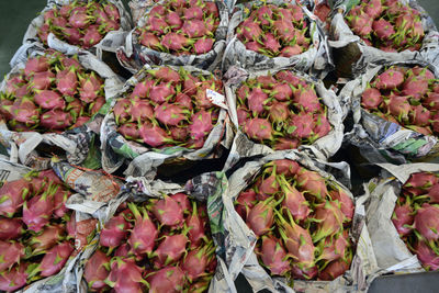 Close-up high angle view of dragon fruits for sale