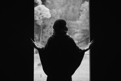 Woman standing against sky