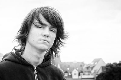 Portrait of boy against clear sky