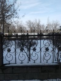 View of bridge in city against sky