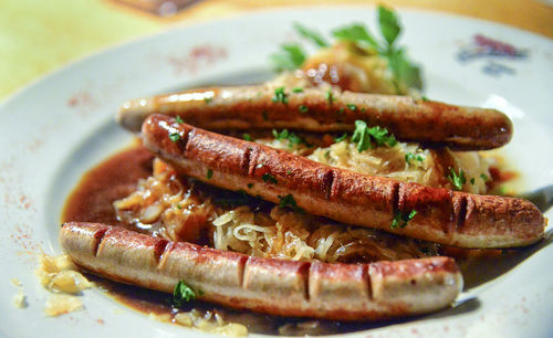 Close-up of sausages served in plate